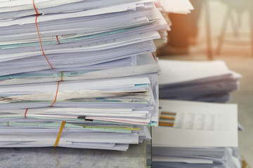 Close up of business documents stack on desk , report papers stack