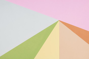 Flat lay of pastel colorful papers background.