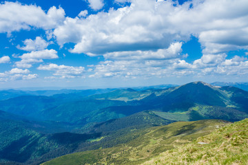 Beautiful landscape of the clouds and mountains from the top