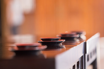 Obraz na płótnie Canvas Sake cup on table for drink sake ceremony in japanese buddhist nichiren or shinto wedding ceremony
