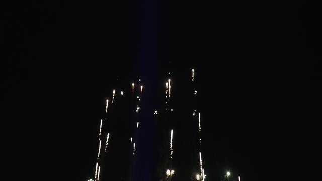 Lights in the sky. Night celebration, view of the fireworks, colorful lights of fireworks in the sky.
