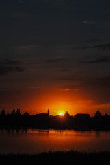 Naklejka premium Sunset over the lake