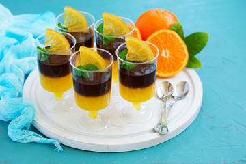 Orange chocolate mousse in portioned cups.