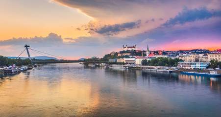 Cityscape of Bratislava, Slovakia at Sunset  as Seen from a Bridge over Danube River Towards Old Town of Bratislava.