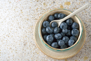 Fresh organic blueberries in a bowl