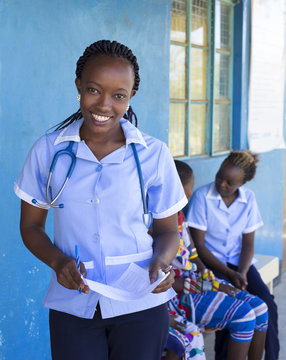 Portrait Of Nurse In Clinic. Kenya, Africa.