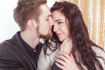 Attractive guy with a girl kissing