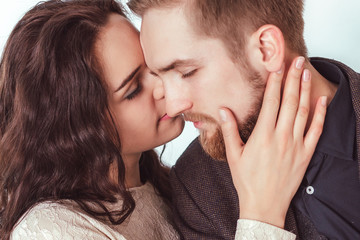 Attractive guy with a girl kissing
