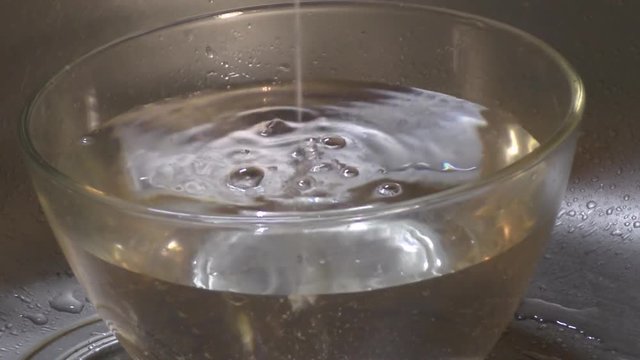 Glass bowl is filled with water
