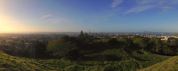 panorama of Auckland, New Zealand at sunset from summit of Mount Eden