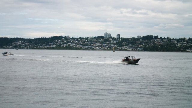 White Rock British Columbia Canada Background Waterfront View Crabbing Boats Speeding Across Water