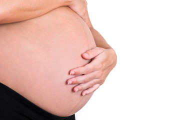 Pregnant woman isolated on white background.Copyspace

