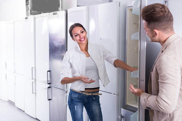 couple selecting  refrigerator