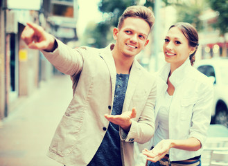 Traveller asking woman direction