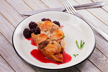 Rabbit in blackberry sauce with thyme and rosemary