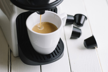 machine serving espresso coffee top view