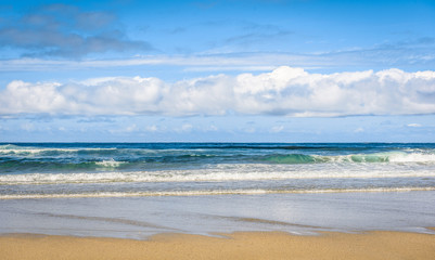 Tropical sandy beach and sea of Atlantic ocean in Spain.