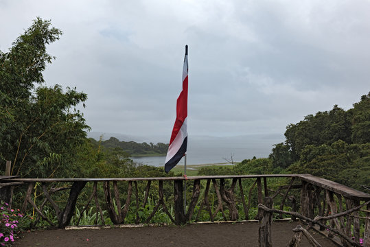 Viewpoint with flag at lake arenal, costa rica