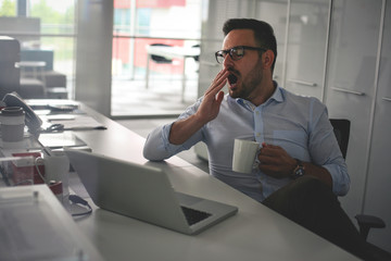 Business man dreaming on office desk. Business man in office
