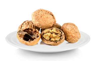 walnut in white plate on white background