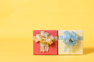 Gift box on yellow color background,Present for giving in holidays