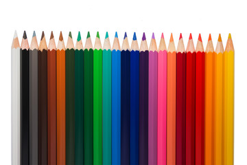 Line of colored pencils isolated on white