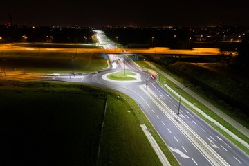 Crossroads and roundabout at night.