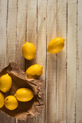 fresh lemons on wooden background