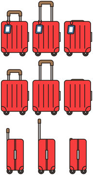 赤い旅行用のトランクケース（キャリー付き）