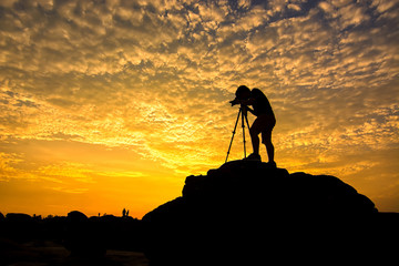 The silhouette of the photographer is taking a photo on February 25,2017 in Thailand.