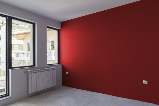 Unfinished interior of apartment  under construction. Painted wa