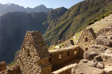 Fototapeta na wymiar Ruine eines Seinhauses in Machu Picchu mit den Anden im Hintergrund