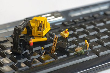 Workers repairing keyboard