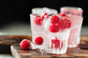 Red refreshing cocktail with raspberry and mint