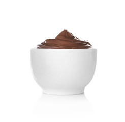 Bowl with delicious chocolate sauce on white background