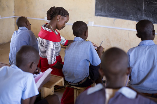 Teacher teaching students in the classroom