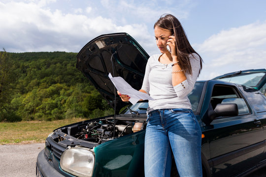 White Girl Calling For Auto Repair Service After Her Car Broke Down At The Highway