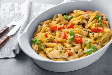 Baking dish with delicious turkey tetrazzini on table