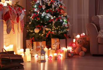 Decorated living room with beautiful Christmas tree