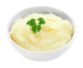 Bowl with mashed potatoes on white background