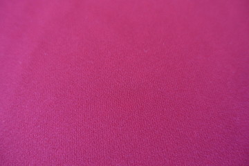 Close up of bright pink plain fabric