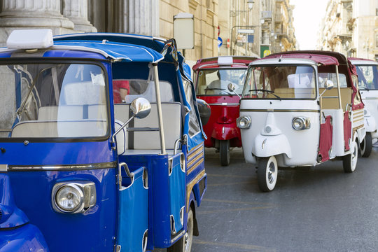 Tuk-tuks in the street of Palermo