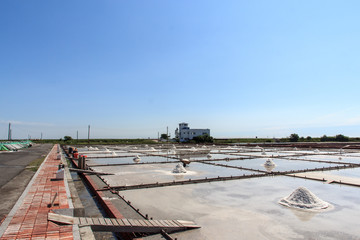 Fototapeta premium Jing-Zai-Jiao Tile-Paved Salt Fields in Tainan, Taiwan 
