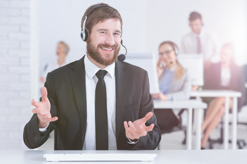 Man wearing suit and headset