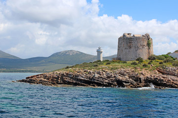 Fototapeta na wymiar Light house and fort ruins in Sardinia 