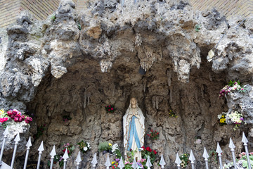 Holy Mary statue in chapel with the appearance of a grotto