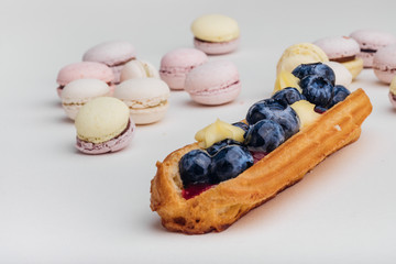  macarons  and Brewed cake eclair