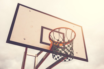 Basketball basket with warm sunlight