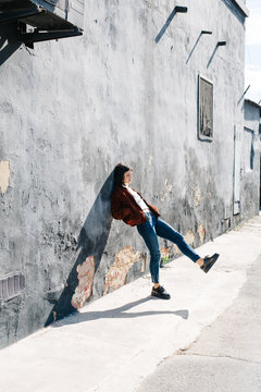 Young woman trudging in boredom
