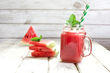 Two summer refreshing smoothie of watermelon and mint on a white background. Top view.